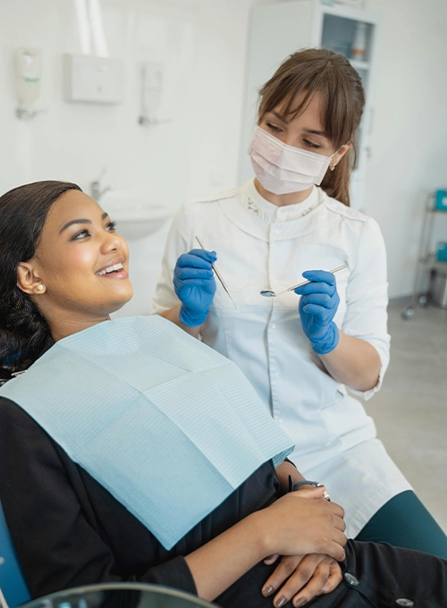 Woman Receiving Dental Exam